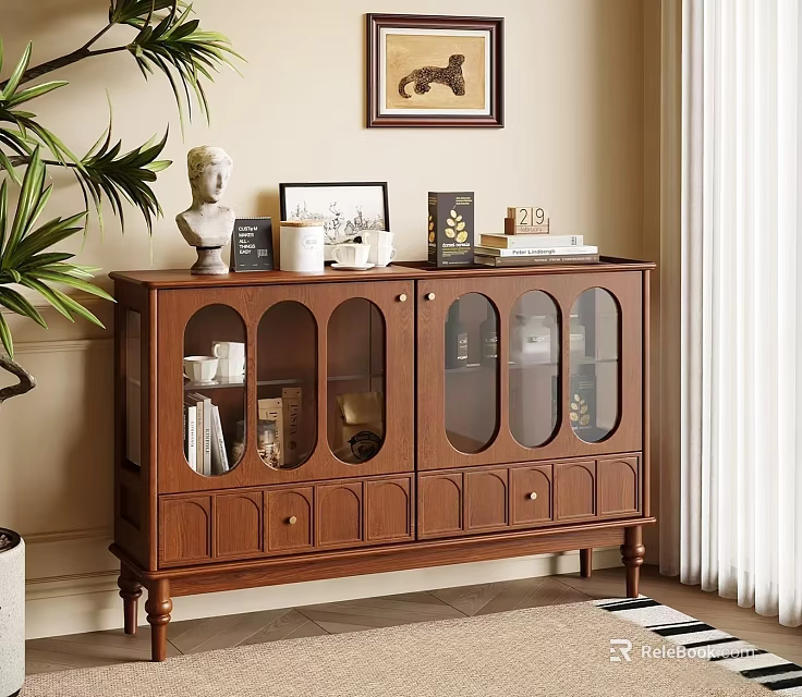 Wooden Sideboard With Glass Doors And Decorative Figurines Frames Books Near Potted Plant Wall Art 3d model 