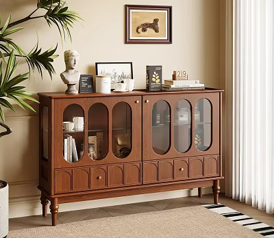 Wooden Sideboard With Glass Doors And Decorative Figurines Frames Books Near Potted Plant Wall Art 3d model