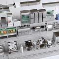 Stainless Steel Commercial Kitchen Featuring Various Cooking Appliances And Food Display Counters