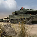 Military Utility Vehicles Featuring Tank And Armored Car In Open Terrain With Rocks And Grass