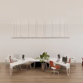 Modern White Office Desk in Open Workspace With Orange Chairs Green Plants and Hanging Lights