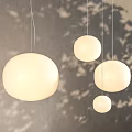 Modern White Spherical Pendant Lights Hanging In Interior With Light Shadows 3d model