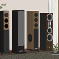 Modern Floor Standing Speakers With Wooden And Gray Finish In Home Audio Setup