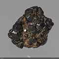Natural Black Crystalline Stone With Metallic Luster And Brown Matrix