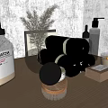 Stylish Bathroom Countertop With Rolled Towels Glass Bottles Candle And Dried Plants