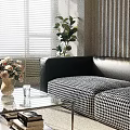 Black Leather Sofa With Checkered Cushions Glass Coffee Table Set Rattan Lamp Natural Light Blinds
