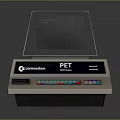 Commodore PET Vintage Electronic Device With Screen Display And Colorful Keypad Keyboard