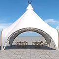 Outdoor White Tent Structure With Decorative Arch And Dining Tables Chairs On Stone Pavement