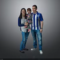 Happy Family Portrait With Parents And Child Standing Together In Casual Clothing