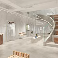 Modern Clothing Store Interior With Fashion Apparel Displays And Glass Staircase Design