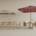 Stylish Outdoor Table With Rattan Chairs And Red Umbrella For Patio Dining Space