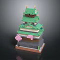 Block Built Japanese Tower Building With Green Roof And Pink Cherry Blossom Decorations