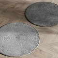 Two Round Rugs With Braided Texture On Herringbone Wood Floor 3d model
