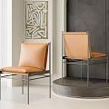 Modern Tan Leather Dining Chairs With Sleek Metal Frame In Minimalist Interior Space