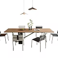 Modern Dining Table And Chairs Set With Wooden Top Metal Frames Plant Fruit Bowl And Magazine