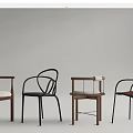 Various Designed Leisure Chairs With Wooden Frames Metal Legs And Curved Backrests