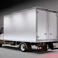 White Commercial Box Truck With Spacious Cargo Area And Modern Exterior Design