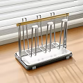 Stainless Steel Kitchen Decorative Storage Rack With Golden Rod And White Base On Wooden Countertop