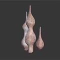 Three Unique Shaped Decorative Ceramic Furniture Pieces With Natural Tones And Textured Surface