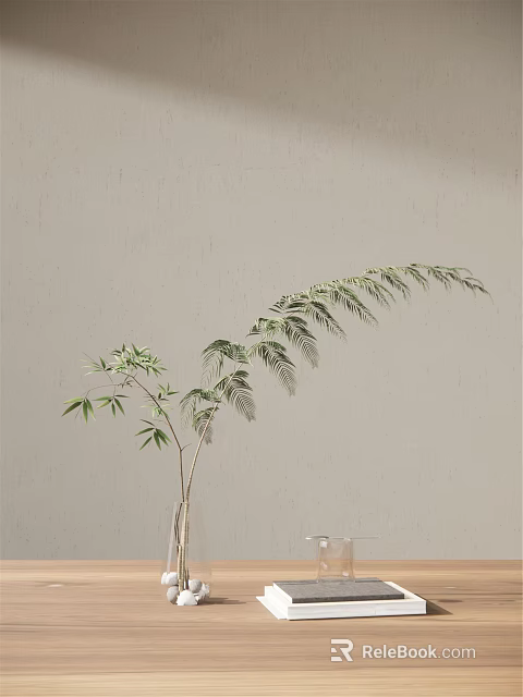 Decorative Glass Vase With Bamboo Leaves Against Light Colored Wall 3d model 