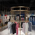 Modern Clothing Store Interior With Trendy Apparel Displays And Comfortable Seating Area