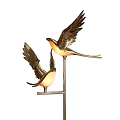 Decorative Lamp Featuring Bird Shaped Design With Metallic Wings And Warm Glow For Interior Decoration