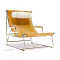 Modern Yellow Leather Lounge Chair with Metal Frame Small Round Side Table and White Cushion