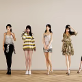 Six Women in Different Stylish Outfits Standing in a Line on Wooden Floor