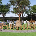 Sheep Grazing In Family Pasture With Wooden Fence Green Trees And Grass