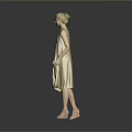 Blonde Woman in Beige Sleeveless Dress with Decorative Pattern Standing Against Gray Background