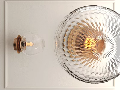 Elegant Modern Wall Sconce With Transparent Cut Glass Shade Brass Base And Warm Light Glow 3d model