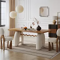 Modern Wooden Dining Table With White Legs And Upholstered Chairs Plus Vase Fruits Books And Pendant Lights