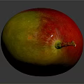 Fresh Ripe Mango with Yellow and Red Skin on Dark Background with Shiny Reflection
