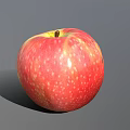 Juicy Fresh Ripe Red Apple With Yellow Streaks Speckled Surface On Gray Background