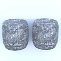 Two Gray Drum Shaped Stools With Textured Stone Like Surface On White Background 3d model