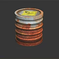 Stacked Drum Lids With Yellow Hazardous Label And Red Stained Surfaces