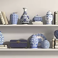 Blue and White Decorative Ornament Set With Vases Jars Box Plate and Books On Shelf