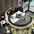 Round Double Bed Modern Bedroom With Black White Headboard Pillows Striped Blanket Colorful Rug