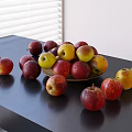 Pile of Colorful Fresh Apples On Black Table Near White Blinds