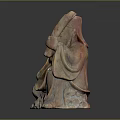 Traditional Man Stone Sculpture in Seated Pose With Bearded Face Holding Long Brownish Red Staff