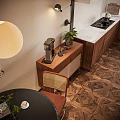 Modern Living Dining Room Interior With Wooden Furniture White Armchair Stacked Books And Pendant Lights