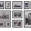 Modern Black And White Photo Wall With Various Sized Frames And Cityscape 3d model