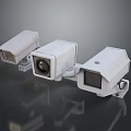 Three White Computer Web Cameras With High Definition Lens And Network Functionality