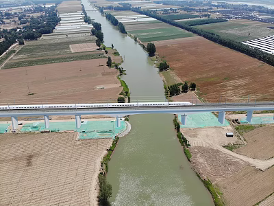High Speed Railway Bridge Over River With Farmland And Passing Train 3d model