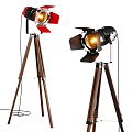 Two Red And Black Floor Lamps With Wooden Tripod Bases And Barn Door Shades