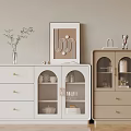 White And Beige Cabinets With Drawers Glass Doors And Decorative Items