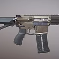 Black And Gold Tactical Rifle Featuring Long Rail Ergonomic Grip And Modern Stock Design