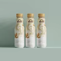 Bottled Plant Milk Drink with Oat Flavor Displayed on Light Green Background