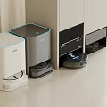 ECOVACS Smart Cleaning Devices With Robot Vacuum And Dust Collection Bases In Modern Room