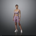 A woman wearing pink sports bra and shorts with white sneakers against gray background